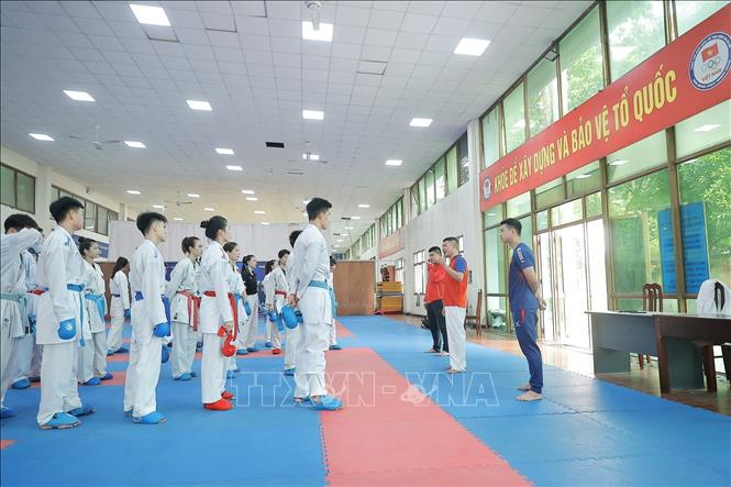 SEA Games là giải đấu quan trọng hàng đầu trong năm 2025, vì đây cũng là thời điểm để đội tuyển chuẩn bị lực lượng tốt nhất hướng tới ASIAD 2026. Nên toàn bộ thành viên đội tuyển đều thận trọng, đánh giá kỹ lưỡng về các đối thủ cạnh tranh trực tiếp trong khu vực, cũng như kiểm tra trình độ các võ sĩ hàng đầu của mình. Ảnh: Minh Quyết – TTXVN