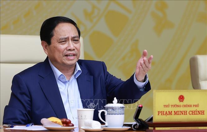 Thủ tướng Phạm Minh Chính chủ trì Hội nghị Chính phủ với địa phương về kịch bản tăng trưởng kinh tế năm 2025. Ảnh: Dương Giang-TTXVN 
