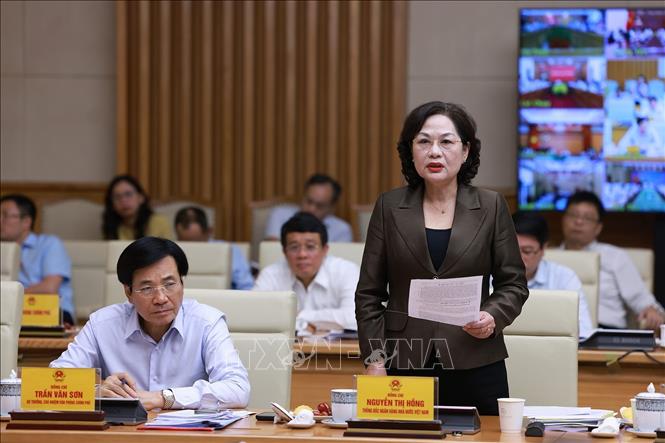 Thống đốc Ngân hàng Nhà nước Nguyễn Thị Hồng phát biểu. Ảnh: Dương Giang-TTXVN