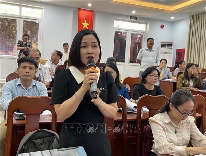 Cán bộ phường Bảo An phát biểu tại hội nghị. Ảnh: Công Thử - TTXVN