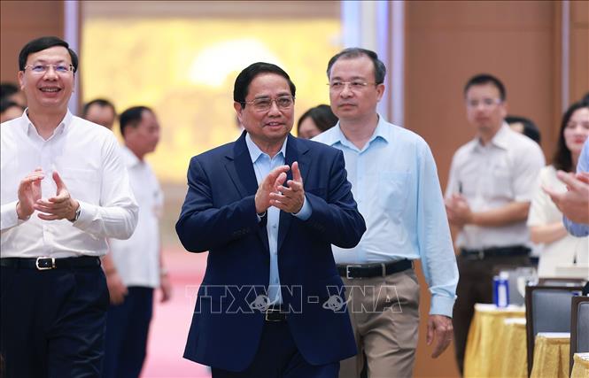 Thủ tướng Phạm Minh Chính đến Phiên họp lần thứ 3 BCĐ về phát triển khoa học, công nghệ, đổi mới sáng tạo, chuyển đổi số và Đề án 06. Ảnh: Dương Giang-TTXVN 
