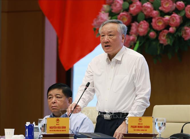 Phó Thủ tướng Thường trực Nguyễn Hoà Bình điều hành Phiên họp lần thứ 3 BCĐ về phát triển khoa học, công nghệ, đổi mới sáng tạo, chuyển đổi số và Đề án 06. Ảnh: Dương Giang-TTXVN 
