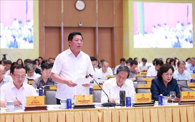 Bộ trưởng Bộ Xây dựng Trần Hồng Minh phát biểu. Ảnh: Dương Giang-TTXVN