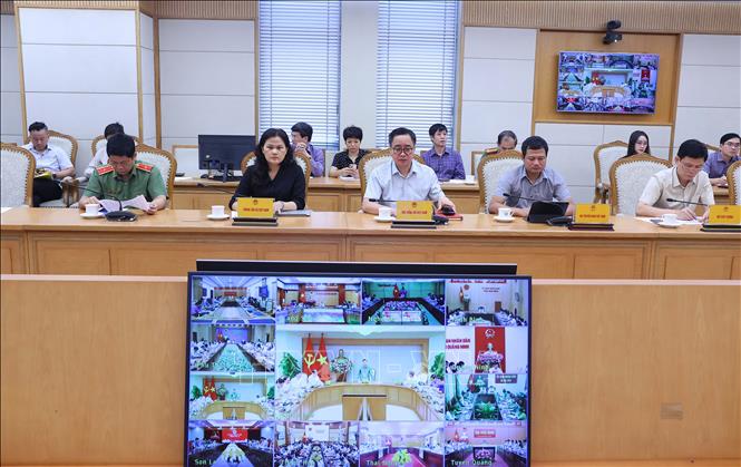 Các đại biểu dự cuộc họp họp ứng phó với cơn bão số 3. Ảnh: Văn Điệp – TTXVN