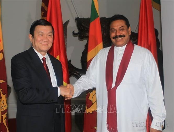 Tổng thống Sri Lanka Mahinda Rajapaksa đón Chủ tịch nước Trương Tấn Sang thăm cấp Nhà nước Sri Lanka (Colombo, 14/10/2011). Ảnh: Nguyễn Khang - TTXVN