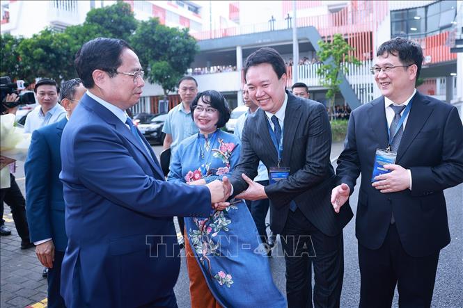 Thủ tướng Phạm Minh Chính đến dự Lễ công bố quyết định chuyển đổi mô hình từ Trường Đại học Phenikaa thành Đại học Phenikaa. Ảnh: Dương Giang-TTXVN