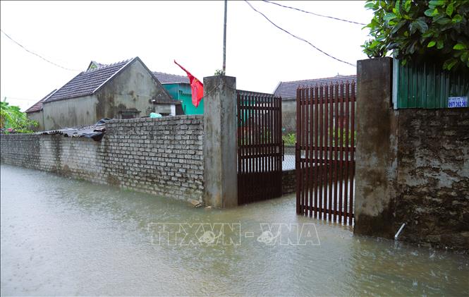 Sáng 22/7/2025, địa bàn tỉnh Nghệ An có mưa lớn kéo dài khiến nhiều khu vực, vùng trũng thấp ở nhiều xã xảy ra tình trạng ngập cục bộ. Ảnh: Xuân Tiến - TTXVN 