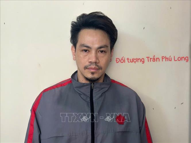 Đối tượng Trần Phú Long tại cơ quan Công an. Ảnh: TTXVN phát