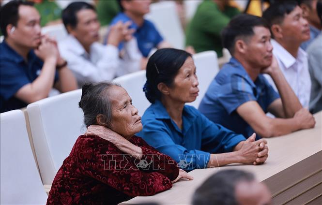 Đại diện thân nhân liệt sĩ tham dự hội nghị về thu nhận mẫu ADN cho thân nhân của liệt sĩ chưa xác định được danh tính trên toàn quốc. Ảnh: Dương Giang-TTXVN
