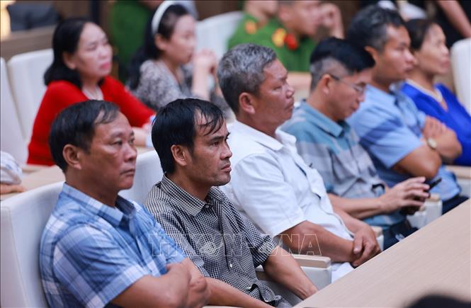 Đại diện thân nhân liệt sĩ tham dự hội nghị về thu nhận mẫu ADN cho thân nhân của liệt sĩ chưa xác định được danh tính trên toàn quốc. Ảnh: Dương Giang-TTXVN
