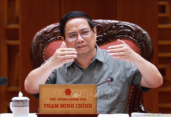 Thủ tướng Phạm Minh Chính chủ trì cuộc họp về triển khai chiến dịch xây dựng trường học cho các xã biên giới. Ảnh: Dương Giang-TTXVN 