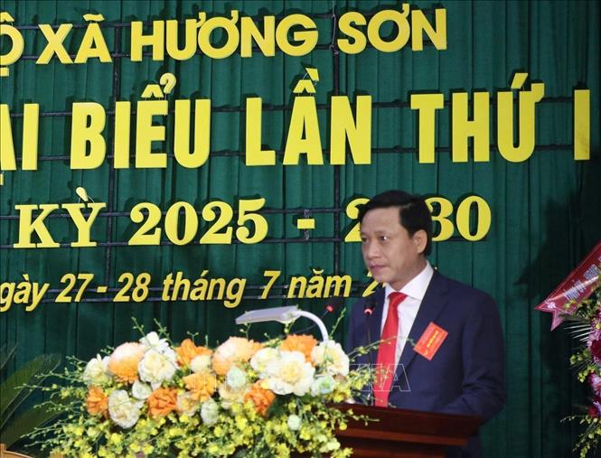 Đồng chí Hồ Thái Sơn, Phó Bí thư Đảng ủy, Chủ tịch UBND xã Hương Sơn phát biểu khai mạc Đại hội. Ảnh: Công Tường-TTXVN