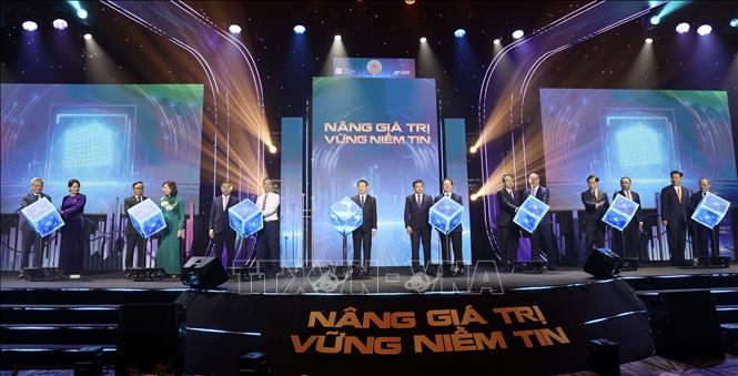 Nghi thức khai trương hệ thống công nghệ thông tin mới của thị trường chứng khoán Việt Nam. Ảnh: Hứa Chung-TTXVN