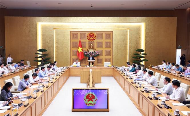 Thủ tướng Phạm Minh Chính chủ trì họp sơ kết 1 tháng vận hành chính quyền địa phương hai cấp. Ảnh: Dương Giang-TTXVN 
