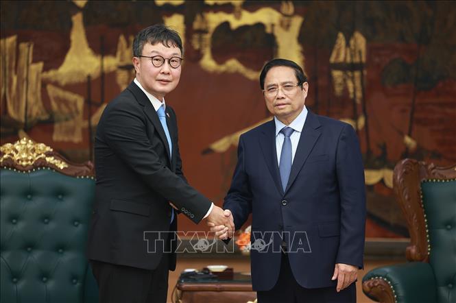 Thủ tướng Phạm Minh Chính tiếp ông Hyoung Nyon Kim, Phó Chủ tịch Tập đoàn Dunamu của Hàn Quốc. Ảnh: Dương Giang-TTXVN
