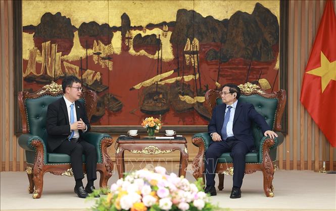 Thủ tướng Phạm Minh Chính tiếp ông Hyoung Nyon Kim, Phó Chủ tịch Tập đoàn Dunamu của Hàn Quốc. Ảnh: Dương Giang-TTXVN
