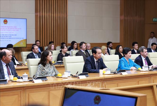 Đại diện các nước, tổ chức quốc tế tại Việt Nam tham dự buổi gặp. Ảnh: Dương Giang-TTXVN 
