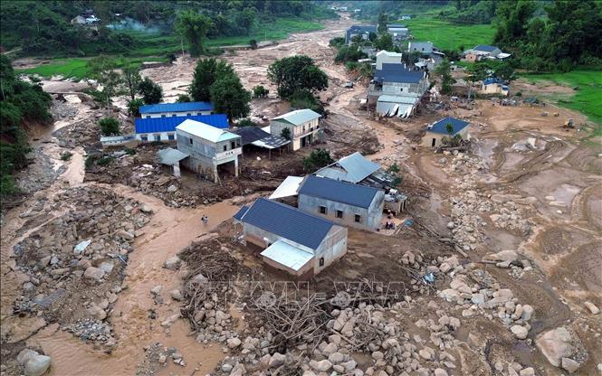 Bản Đứa Cát, xã Chiềng Sơ tan hoang sau trận lũ ống, lũ quét. Ảnh: Quang Quyết - TTXVN
