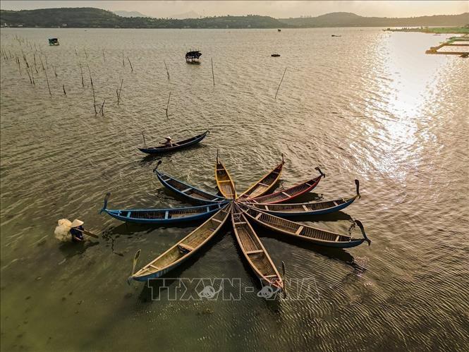 O Loan Lagoon is surrounded by mountain ranges, creating a splendid scene at sunset. VNA Photo: Khánh Hòa