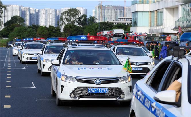 Khối xe ô tô lực lượng Cảnh sát giao thông tham gia diễu binh, diễu hành tại buổi hợp luyện lần 3. Ảnh: Phạm Kiên - TTXVN