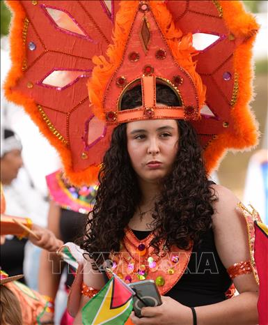 Lễ hội đường phố Caribbean Days năm 2025 đang diễn ra tại Coquitlam, British Columbia, Canada, tôn vinh âm nhạc, ẩm thực, trang phục và văn hóa đặc trưng vùng Caribe. Ảnh: THX/TTXVN