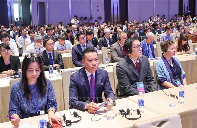 Các đại biểu tham dự Hội nghị quán triệt, triển khai Nghị quyết của Quốc hội về Trung tâm tài chính quốc tế tại Việt Nam. Ảnh: Dương Giang-TTXVN