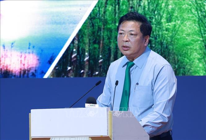 Bộ trưởng Bộ Xây dựng Trần Hồng Minh phát biểu. Ảnh: Dương Giang-TTXVN