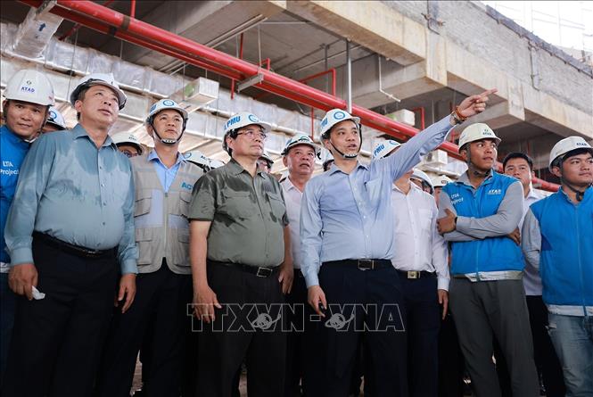 Thủ tướng Phạm Minh Chính kiểm tra tiến độ thi công Dự án Cảng hàng không quốc tế Long Thành. Ảnh: Dương Giang-TTXVN