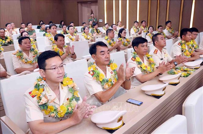 Các điển hình tiên tiến trong lực lượng Công an nhân dân tại buổi gặp mặt. Ảnh: Phạm Kiên - TTXVN