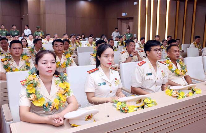 Các điển hình tiên tiến trong lực lượng Công an nhân dân tại buổi gặp mặt. Ảnh: Phạm Kiên - TTXVN