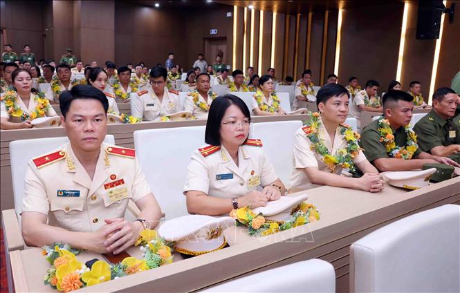 Các điển hình tiên tiến trong lực lượng Công an nhân dân tại buổi gặp mặt. Ảnh: Phạm Kiên - TTXVN