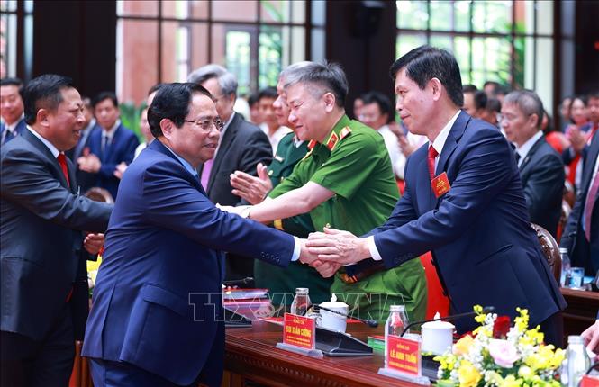 Thủ tướng Phạm Minh Chính với các đại biểu dự Đại hội đại biểu Đảng bộ Bộ Xây dựng nhiệm kỳ 2025 - 2030. Ảnh: Dương Giang - TTXVN
