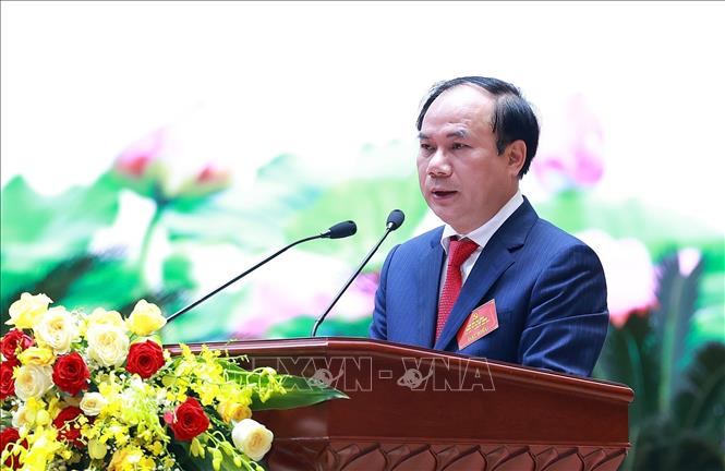 Phó Bí thư Thường trực Đảng ủy, Thứ trưởng Bộ Xây dựng Nguyễn Văn Sinh trình bày Báo cáo chính trị. Ảnh: Dương Giang - TTXVN
