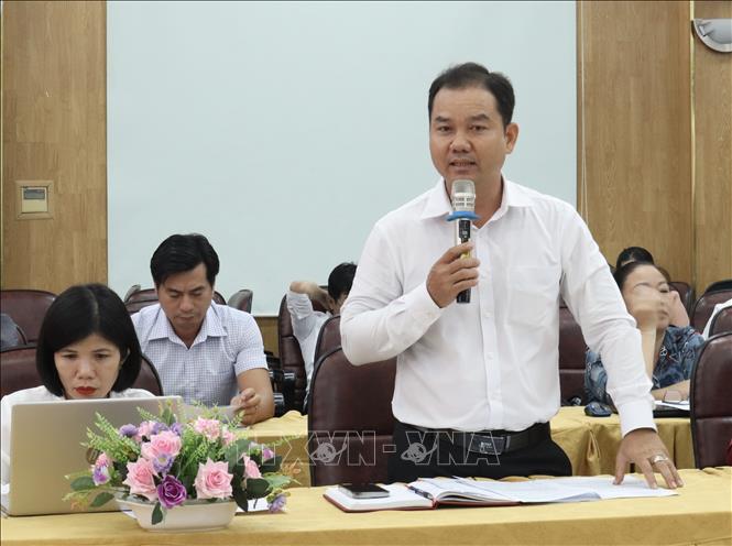 Đại diện Sở Tư pháp tỉnh Tây Ninh nêu ý kiến  tại toạ đàm. Ảnh: Xuân Anh - TTXVN