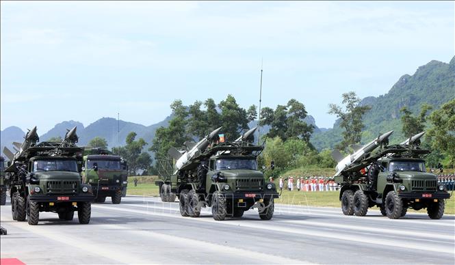 The military artillery tractors in the rehearsal. VNA Photo: Tuấn Anh 