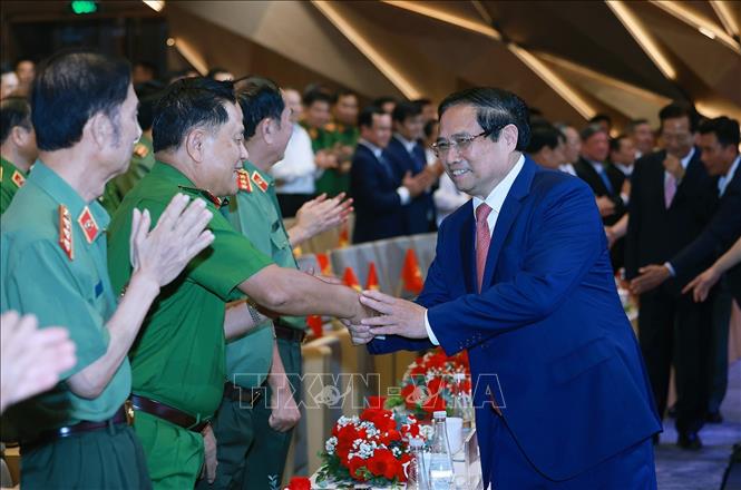 Thủ tướng Phạm Minh Chính với các đại biểu dự Đại hội Thi đua “Vì an ninh Tổ quốc” lần thứ 9. Ảnh: Dương Giang - TTXVN
