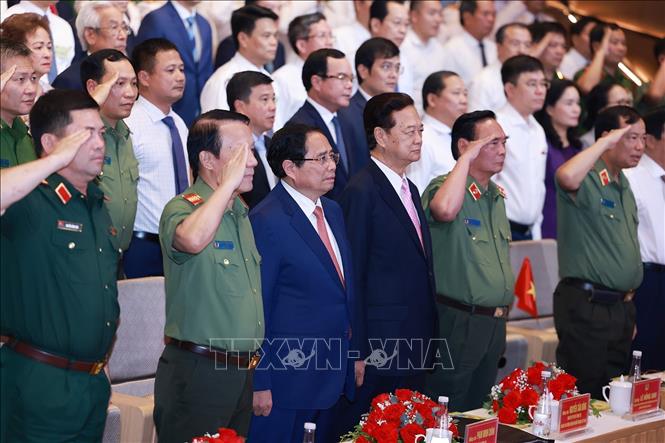 Thủ tướng Phạm Minh Chính và các đại biểu dự Đại hội Thi đua “Vì an ninh Tổ quốc” lần thứ 9. Ảnh: Dương Giang-TTXVN
