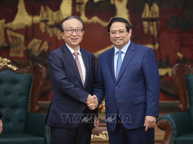 Thủ tướng Phạm Minh Chính tiếp ông Hironori Kamezawa, Tổng giám đốc Tập đoàn MUFG, Nhật Bản. Ảnh: Dương Giang-TTXVN 