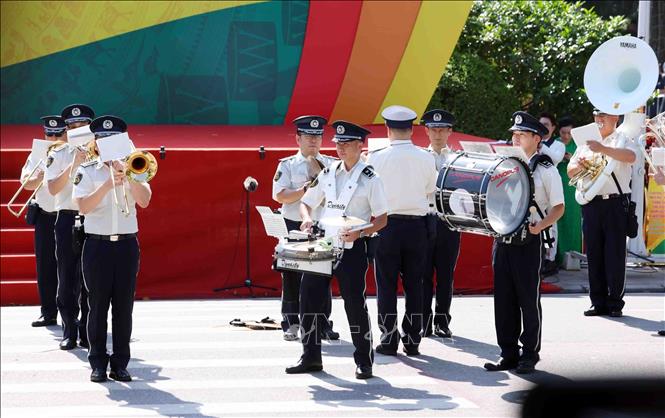 The Tokyo Metropolitan Police Band, National Police Agency of Japan, performs at the event. Photo: Pham Kien – VNA