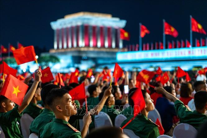 People attend the programme in Hanoi. Photo: VNA