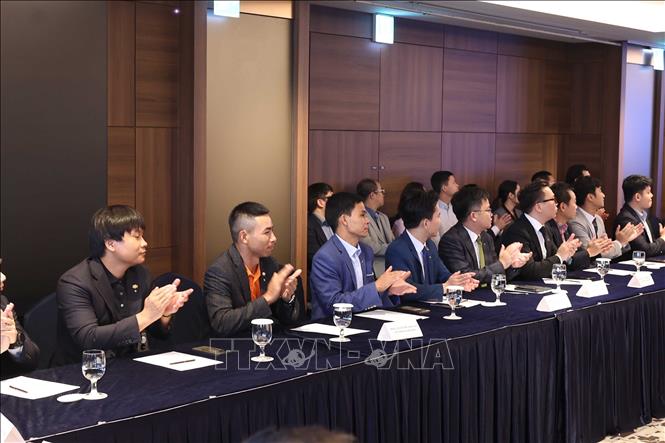 Các đại biểu tham dự buổi gặp mặt. Ảnh: Thống Nhất - TTXVN