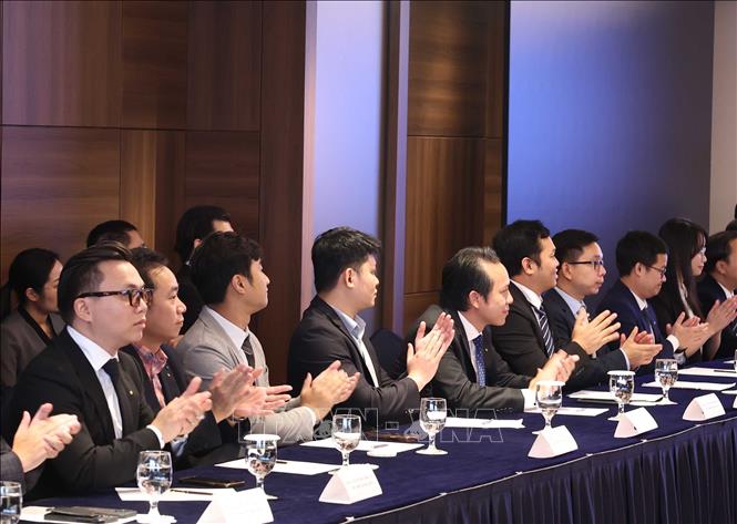 Các đại biểu tham dự buổi gặp mặt. Ảnh: Thống Nhất - TTXVN
