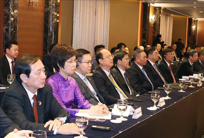 Các đại biểu đoàn Việt Nam tham dự buổi gặp mặt. Ảnh: Thống Nhất - TTXVN