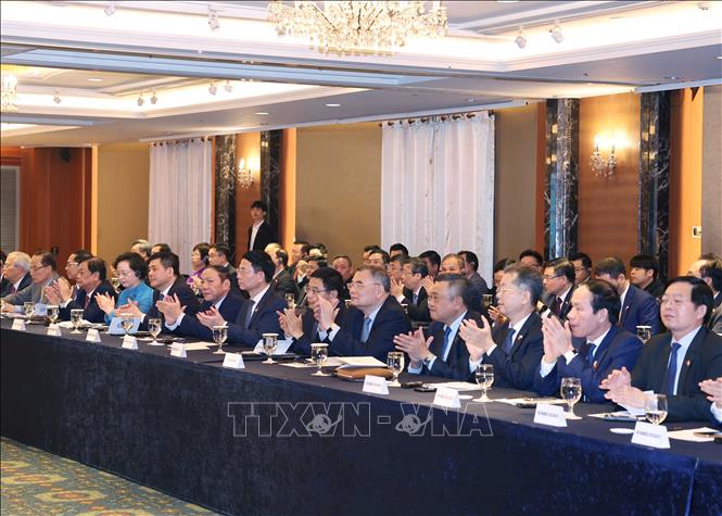 Các đại biểu đoàn Việt Nam tham dự buổi gặp mặt. Ảnh: Thống Nhất - TTXVN