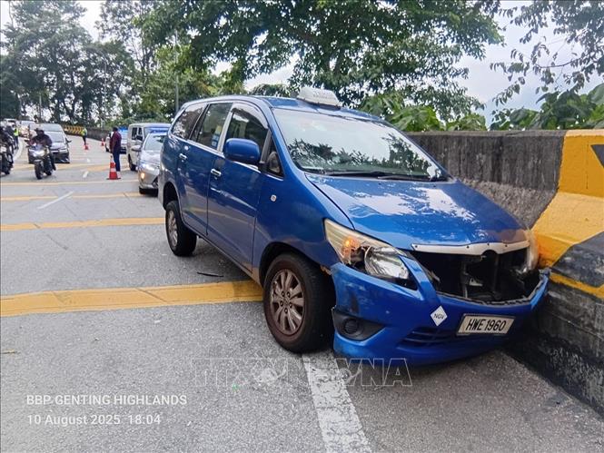 Hiện trường vụ tai nạn xe buýt chở khách du lịch Việt Nam tại Pahang, Malaysia. Ảnh: TTXVN phát