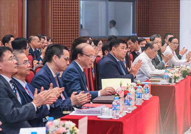 Phó Thủ tướng Nguyễn Chí Dũng cùng các đại biểu tham dự Đại hội, chiều 13/8. Ảnh: Hoàng Hiếu - TTXVN