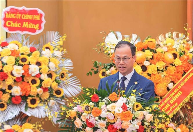 Đồng chí Đỗ Xuân Lân, Uỷ viên Ban Thường vụ Đảng uỷ, Chủ nhiệm Uỷ ban Kiểm tra Đảng uỷ Viện Hàn lâm Khoa học xã hội Việt Nam trình bày báo cáo thẩm tra tư cách đại biểu tham dự Đại hội, chiều 13/8. Ảnh: Hoàng Hiếu - TTXVN