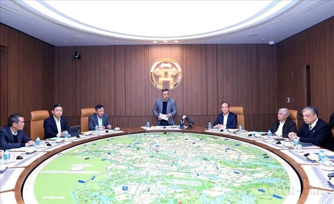 UBND thành phố Hà Nội tổ chức hội nghị làm việc với các nhà khoa học để thực hiện Nghị quyết 57-NQ/TW ngày 22/12/2024 của Bộ Chính trị, Nghị quyết 03/NQ-CP ngày 09/01/2025 của Chính phủ nhằm phát triển khoa học, công nghệ, đổi mới sáng tạo và đào tạo nhân lực chất lượng cao, thúc đẩy tăng trưởng kinh tế Thủ đô (26/2/2025). Ảnh: Văn Điệp - TTXVN