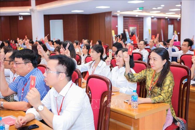 Các đại biểu biểu quyết tại Đại hội, sáng 14/8. Ảnh: Hoàng Hiếu - TTXVN