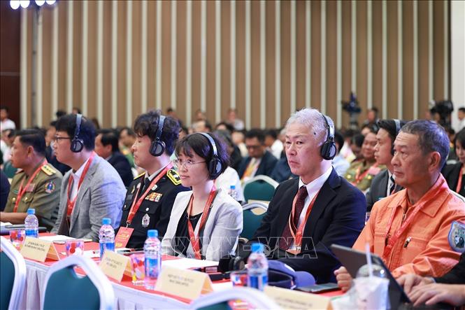 Đại biểu quốc tế tham dự Diễn đàn. Ảnh: Dương Giang-TTXVN 
